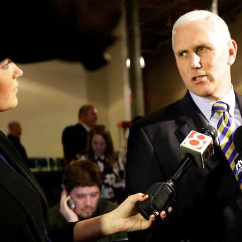 Gov. Mike Pence talks with the media at the Indiana Republican Party elections results viewing party in Indianapolis Tuesday, Nov. 4, 2014. (Photo by AJ Mast/AP)
