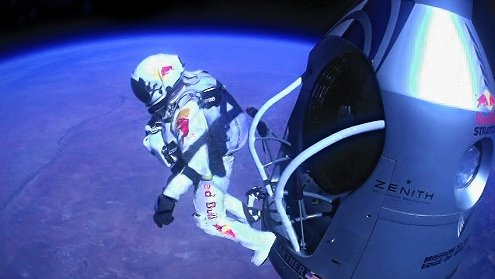 Pilot Felix Baumgartner of Austria jumps out of the capsule during the final manned flight for Red Bull Stratos, Oct. 14, 2012.