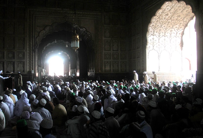 Pakistani Muslims offer prayers at Badshahi mosque on the last Friday of the Muslim holy month of Ramadan in Lahore, Pakistan, Friday, Aug. 2, 2013. (Photo by K.M. Chaudary/AP)