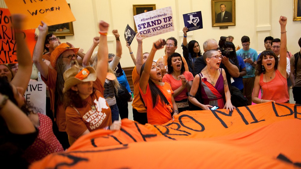 Abortion rights supporters rally on the floor of the State Capitol's rotunda in Austin, Texas, July 12, 2013.