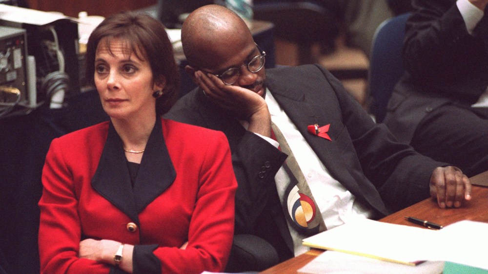 Prosecutors Marcia Clark and Christopher Darden listen to defense attorney Johnnie Cochran Jr., Sep. 27, 1995, as he gives closing arguments during the O.J. Simpson double-murder trial at the Los Angeles Criminal Courts Building. (Photo by Vince Bucci/AP)