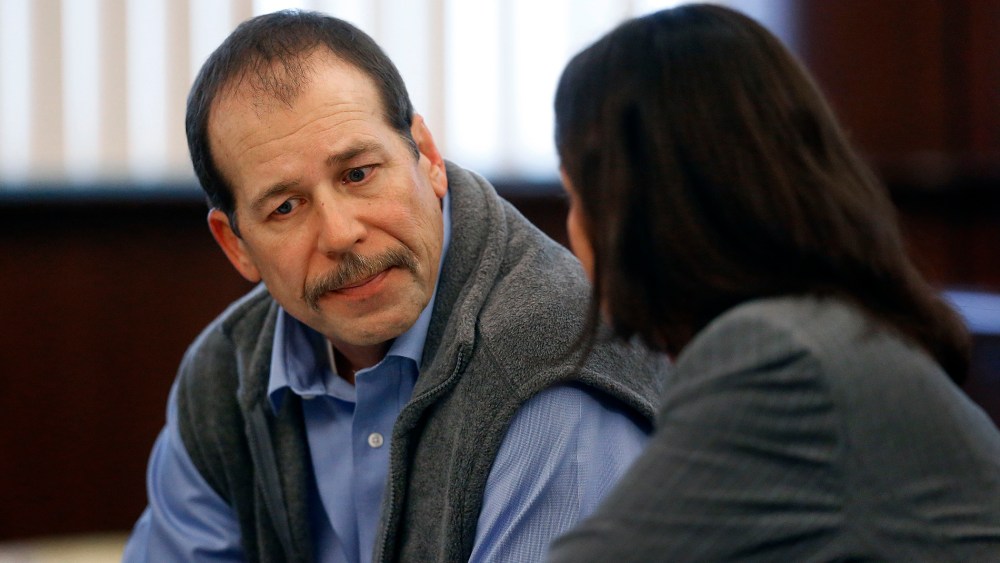 Theodore Wafer listens to his attorney Cheryl Carpenter while appearing at his preliminary examination before District Court Judge David Turfe in Dearborn Heights, Mich., Dec. 18, 2013.