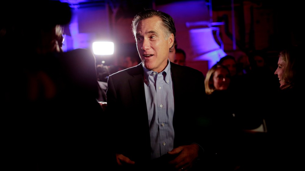 Mitt Romney, the former Republican presidential nominee, talks with people after speaking during the Republican National Committee's winter meeting aboard the USS Midway Museum, Jan. 16, 2015, in San Diego. (Photo by Gregory Bull/AP)
