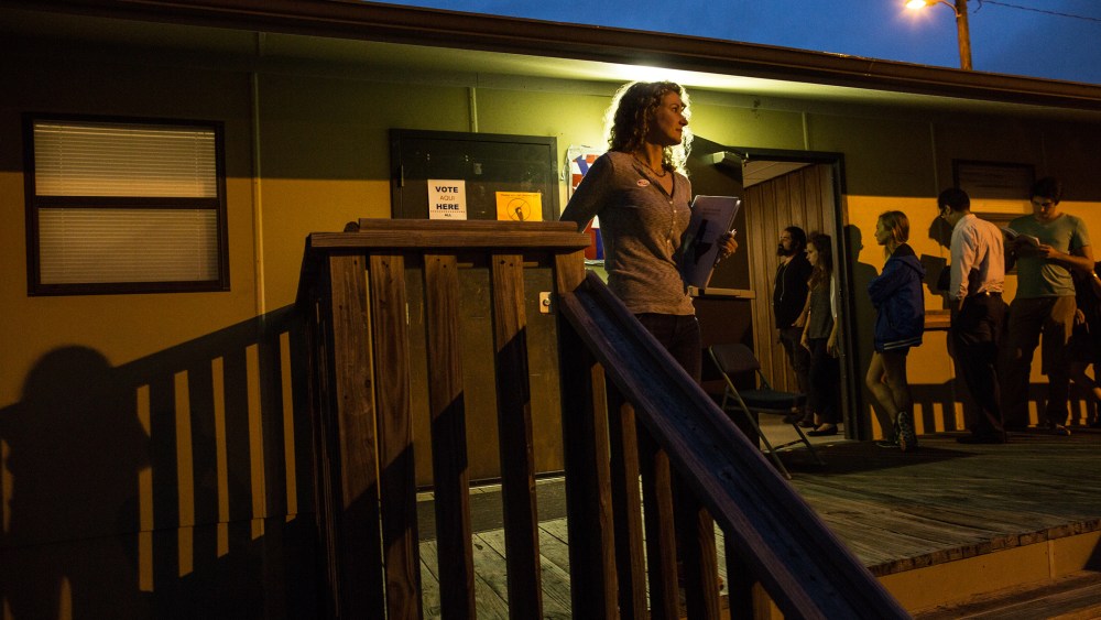 Voters wait in line to cast their ballots in a portable structure outside of David Chapel Baptist Church on Tuesday, Nov. 4, 2014 in Austin, Texas. (Photo by Tamir Kalifa/AP)