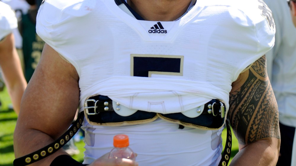 In this April 21, 2012, photo, Notre Dame linebacker Manti Te'o appears at the Blue and Gold spring NCAA college football game in South Bend, Ind. A story that Te'o's girlfriend had died of leukemia _ a loss he said inspired him to help lead the Irish...