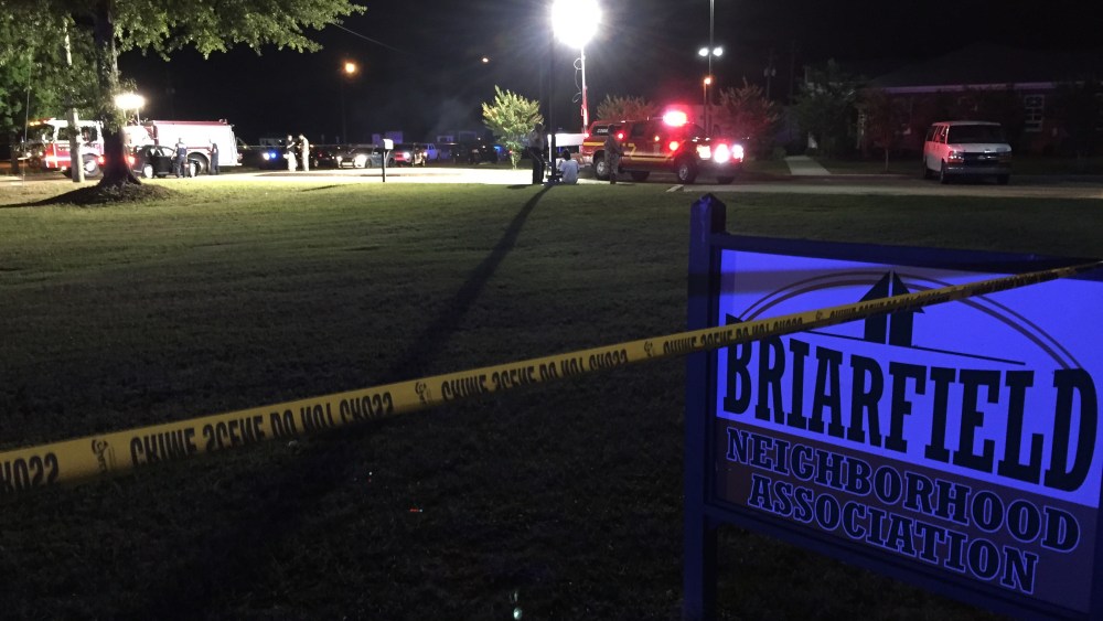 Police investigate the scene of a shooting in Hattiesburg, Miss., on May 9, 2015. Two police officers were killed in the shooting. (Photo by Jason Munz/The Hattiesburg American/AP)