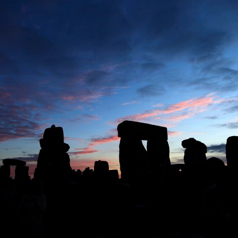 The Stonehenge monument on Salisbury Plain, southern England at sunrise.