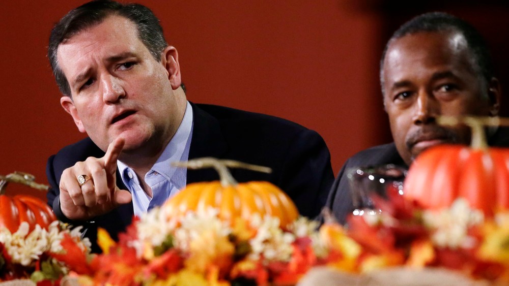 Republican presidential candidate, Sen. Ted Cruz, R-Texas, speaks during the Presidential Family Forum as Ben Carson listens, Nov. 20, 2015, in Des Moines, Iowa. (Photo by Charlie Neibergall/AP)