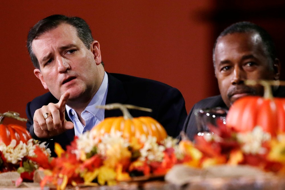 Republican presidential candidate, Sen. Ted Cruz, R-Texas, speaks during the Presidential Family Forum as Ben Carson listens, Nov. 20, 2015, in Des Moines, Iowa. (Photo by Charlie Neibergall/AP)