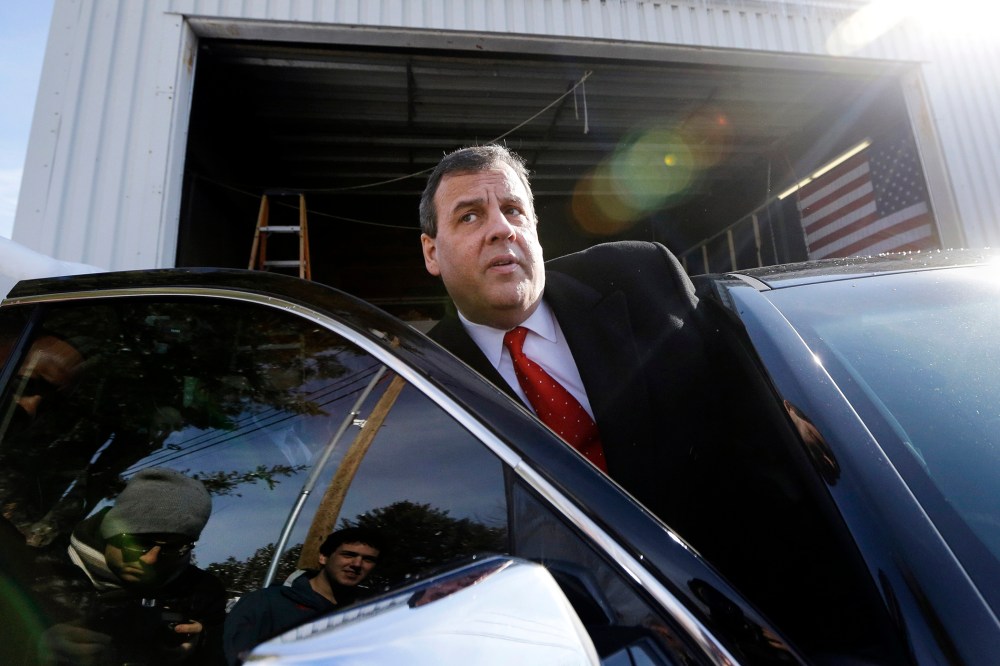 In this Feb. 6, 2016, file photo, then Republican presidential candidate, New Jersey Gov. Chris Christie gets in his car after a campaign event in Bedford, N.H. (Photo by Elise Amendola/AP)