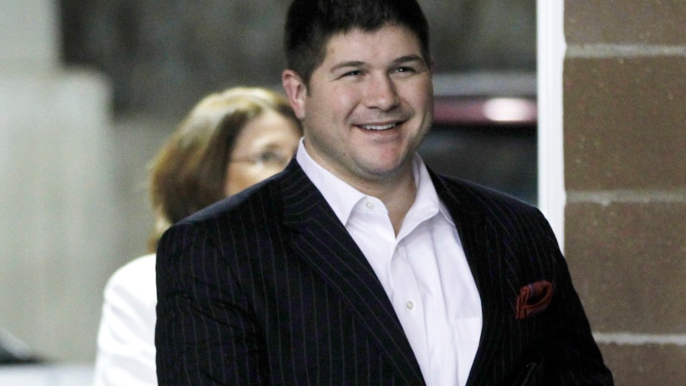 Jesse Benton, campaign manager for Republican presidential candidate, Rep. Ron Paul, R-Texas, arrives at a campaign event honoring veterans at the Iowa State Fairgrounds in Des Moines, Iowa, Dec. 28, 2011. (Photo by Charles Dharapak/AP)