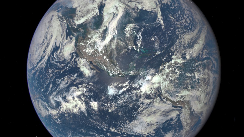 NASA camera on the Deep Space Climate Observatory satellite returned its first view of the entire sunlit side of Earth from one million miles away (Photo by NASA/AP).