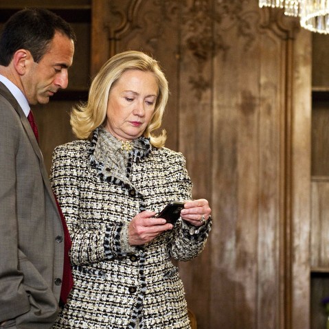 US Secretary of State Hillary Clinton looks at her phone during the 48th Munich Security Conference at the Bayerischer Hof hotel in Munich, Germany, Feb. 4, 2012. (Photo by Jim Watson/Pool/AP)