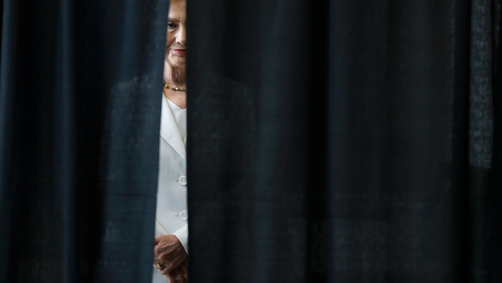 Democratic presidential candidate Hillary Rodham Clinton waits to be introduced before speaking about rural issues at the Des Moines Area Community College, Aug. 26, 2015, in Ankeny, Iowa. (Photo by Charlie Neibergall/AP)