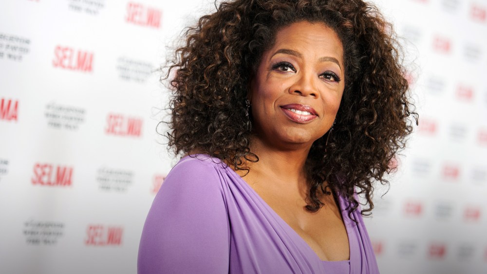In this Dec. 6, 2014 file photo, Oprah Winfrey arrives at Selma And The Legends That Paved The Way Gala in Goleta, Calif. (Photo by Richard Shotwell/Invision/AP)