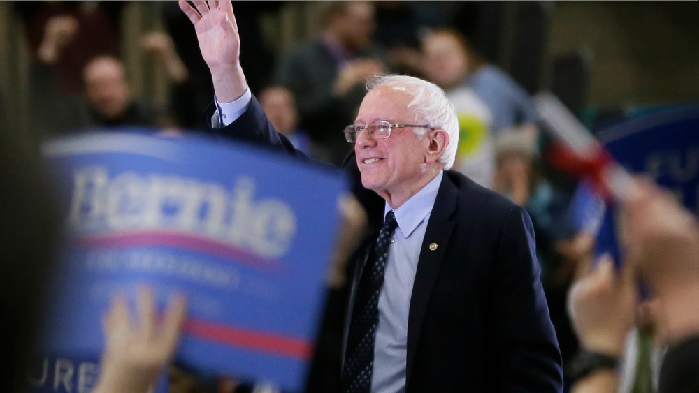 Democratic presidential candidate Sen. Bernie Sanders acknowledges the crowd after speaking at a rally at the Macomb Community College on March 5, 2016, in Warren, Mich. (Photo by Carlos Osorio/AP)