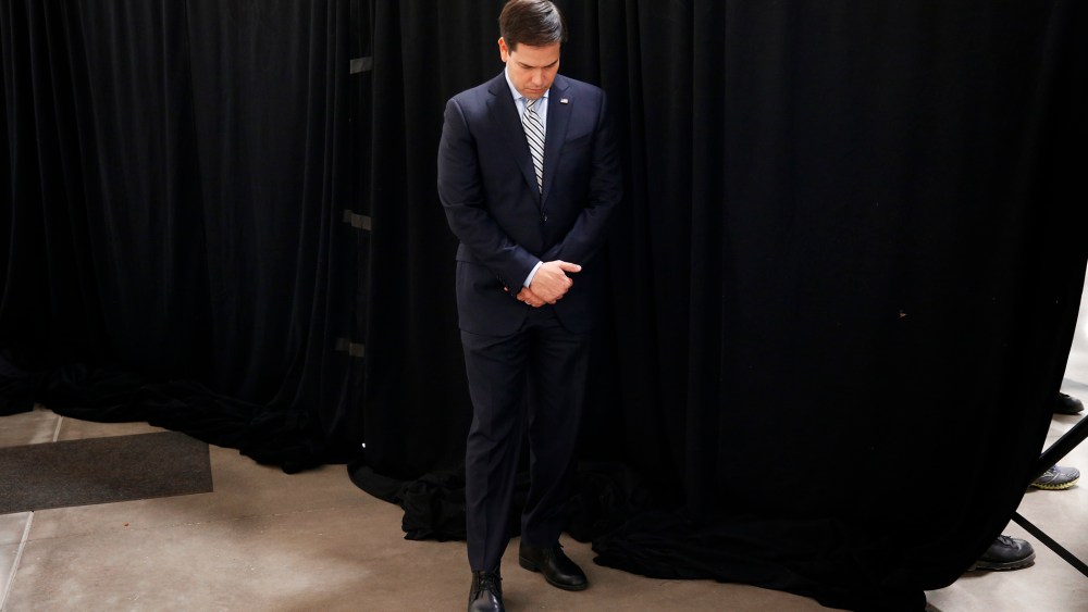 Republican presidential candidate, Sen. Marco Rubio, R-Fla., bows his head in prayer at a campaign rally in Idaho Falls, Idaho, March 6, 2016. (Photo by Paul Sancya/AP)