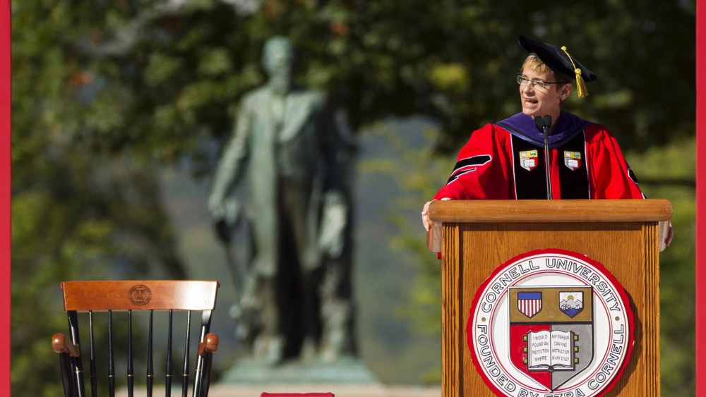 In this Sept. 18, 2015 photo, Cornell University President Elizabeth Garrett delivers her inaugural address at the school in Ithaca, N.Y., on the Arts Quad in front of the statue of Ezra Cornell. (Photo by Simon Wheeler/Ithaca Journal/AP)