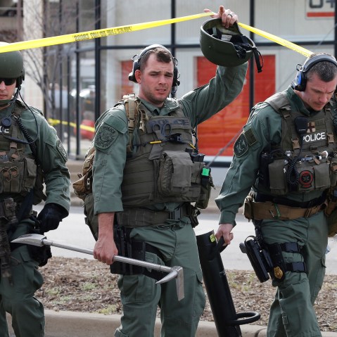 Richmond SWAT team members leave a Greyhound bus station, March 31, 2016 in Richmond, Va. (Photo by Steve Helber/AP)