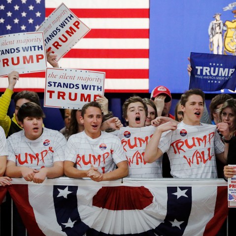Supporters of Republican presidential candidate, Donald Trump, chant, "Build That Wall," before a town hall, April 2, 2016, in Rothschild, Wis. (Photo by Charles Rex Arbogast/AP)