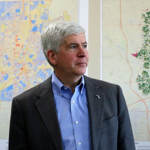 In this Feb. 18, 2016 file photo, Gov. Rick Snyder addresses the media in Flint, Mich. (Photo by Carlos Osorio/AP)
