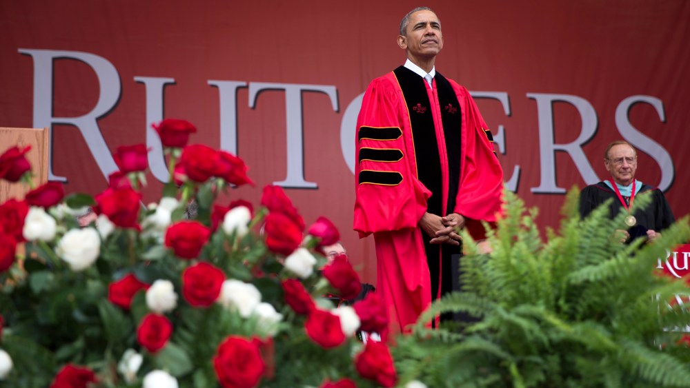 President Barack Obama listens during Rutgers University's 250th Anniversary commencement ceremony, on May 15, 2016, in Piscataway, N.J. (Photo by Evan Vucci/AP)