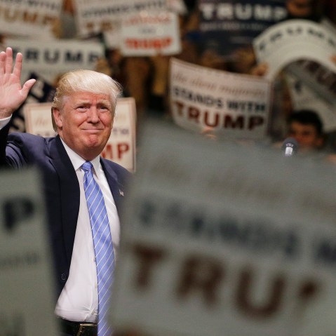 Republican presidential candidate Donald Trump waves to the crowd as he arrives at a rally at the Anaheim Convention Center on May 25, 2016, in Anaheim, Calif. (Photo by Jae C. Hong/AP)