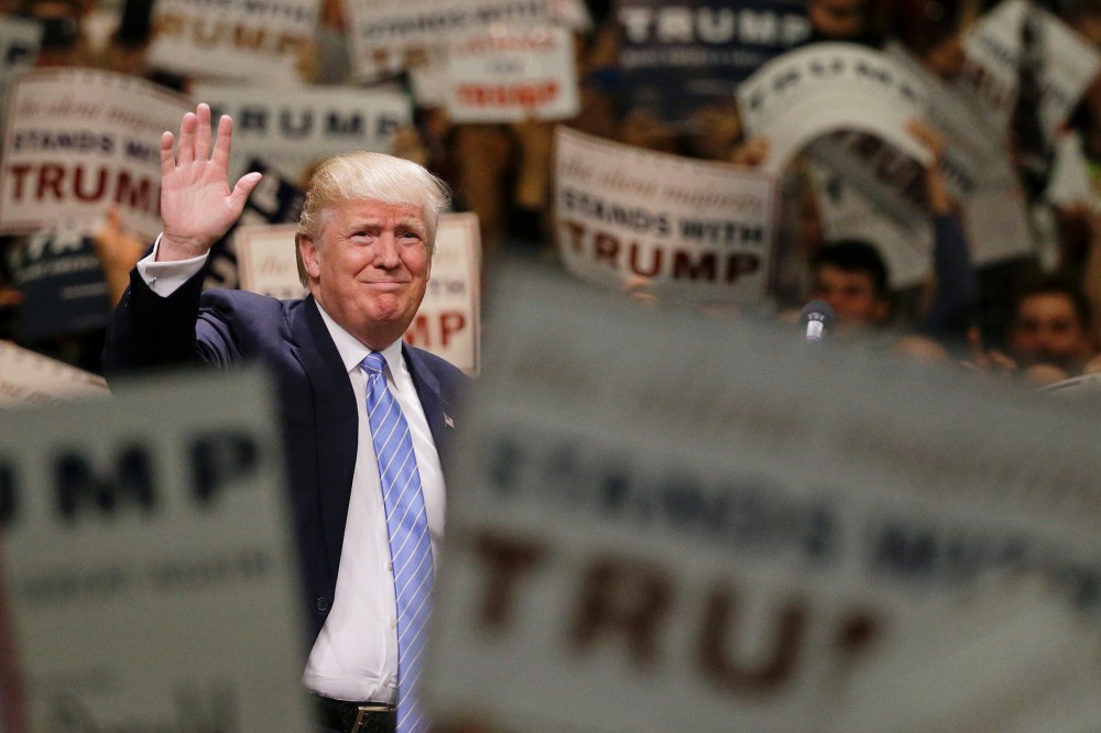Republican presidential candidate Donald Trump waves to the crowd as he arrives at a rally at the Anaheim Convention Center on May 25, 2016, in Anaheim, Calif. (Photo by Jae C. Hong/AP)