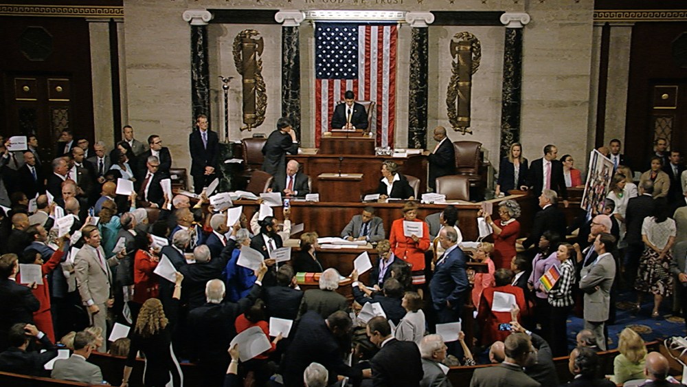 In this image from video provided by House Television, House Speaker Paul Ryan stands at the podium as he brings the House into session in the night of June 22, 2016, in Washington. (Photo by House Television/AP)