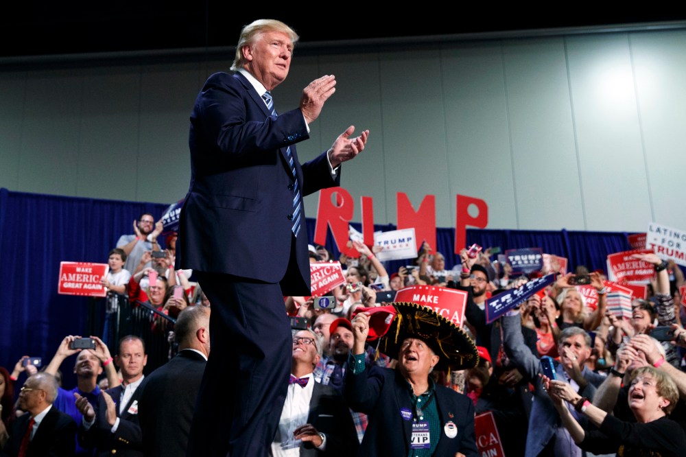 Republican presidential candidate Donald Trump arrives to speak at a campaign rally, Oct. 14, 2016, in Charlotte, N.C. (Photo by Evan Vucci/AP)