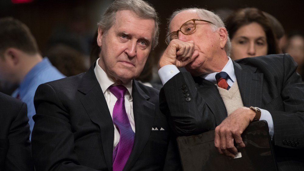 Former Maine Senator and former Defense Secretary William Cohen, left, confers with former Georgia Sen. Sam Nunn as they listen to testimony on Capitol Hill in Washington, Thursday, Jan. 12, 2017.