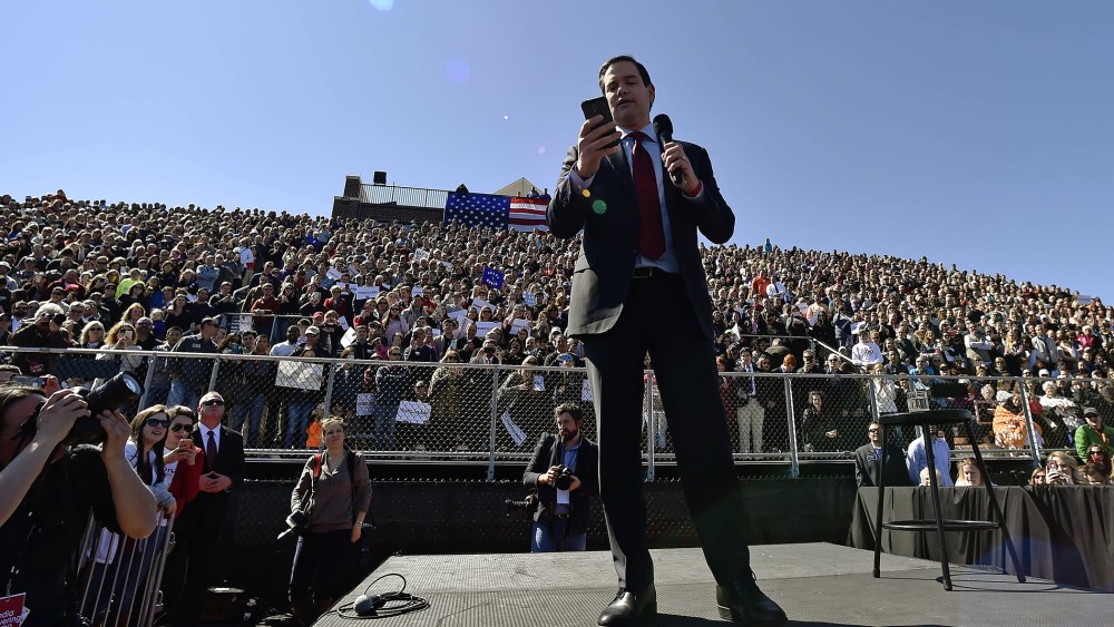 Republican presidential candidate, Sen. Marco Rubio, R-Fla., reads from his phone at Mount Paran Christian School, Feb. 27, 2016, in Kennesaw, Ga. (Photo by Mike Stewart/AP)