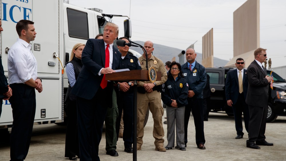 President Donald Trump talks with reporters after reviewing border wall prototypes, Tuesday, March 13, 2018, in San Diego.