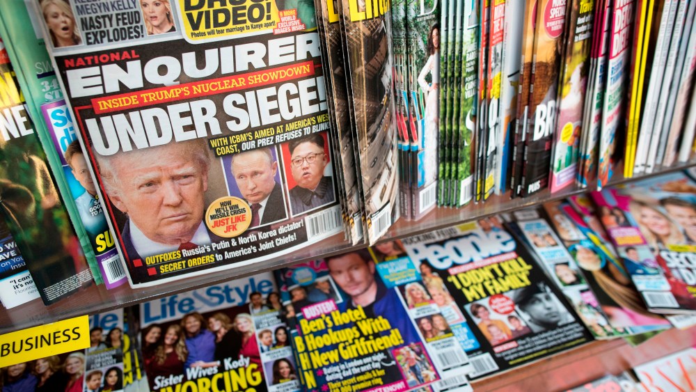 This July 12, 2017, file photo shows the cover of an issue of the National Enquirer featuring President Donald Trump at a store in New York.