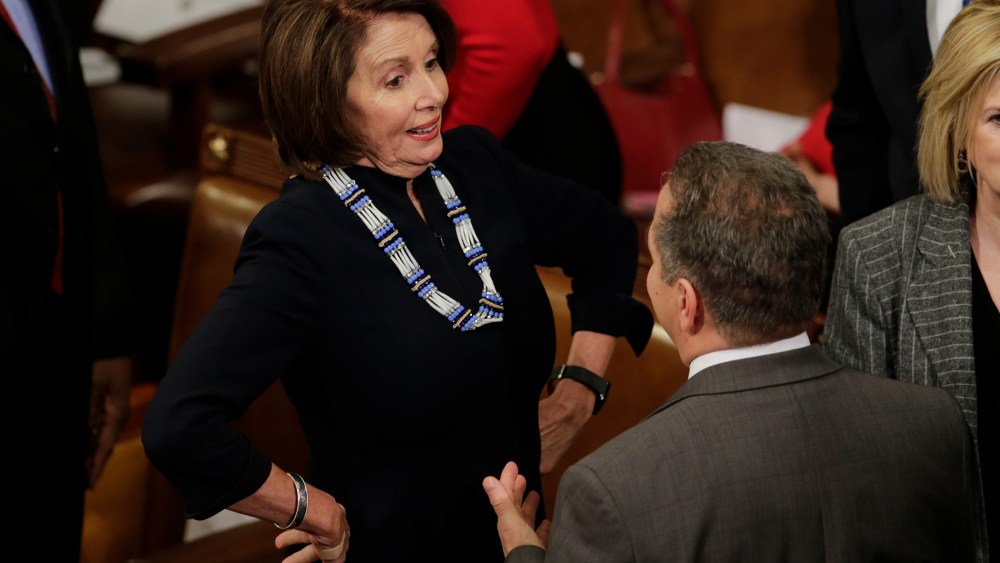 House Minority Leader Nancy Pelosi of Calif. talks on Capitol Hill in Washington, Jan. 12, 2016, prior to President Obama's State of the Union address. (Photo by J. Scott Applewhite/AP)