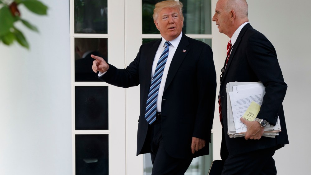 In a Tuesday, May 2, 2017 file photo, President Donald Trump walks with aide Keith Schiller to the Oval Office of the White House in Washington.