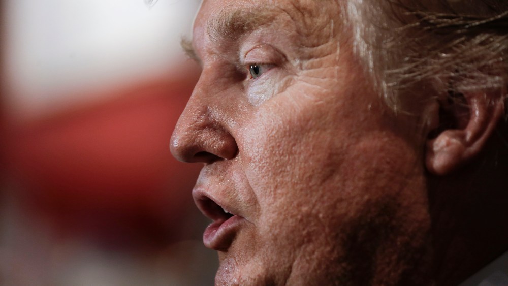 Republican presidential candidate Donald Trump answers questions with reporters after speaking at the National Federation of Republican Assemblies on Aug. 29, 2015, in Nashville, Tenn. (Photo by Mark Humphrey/AP)