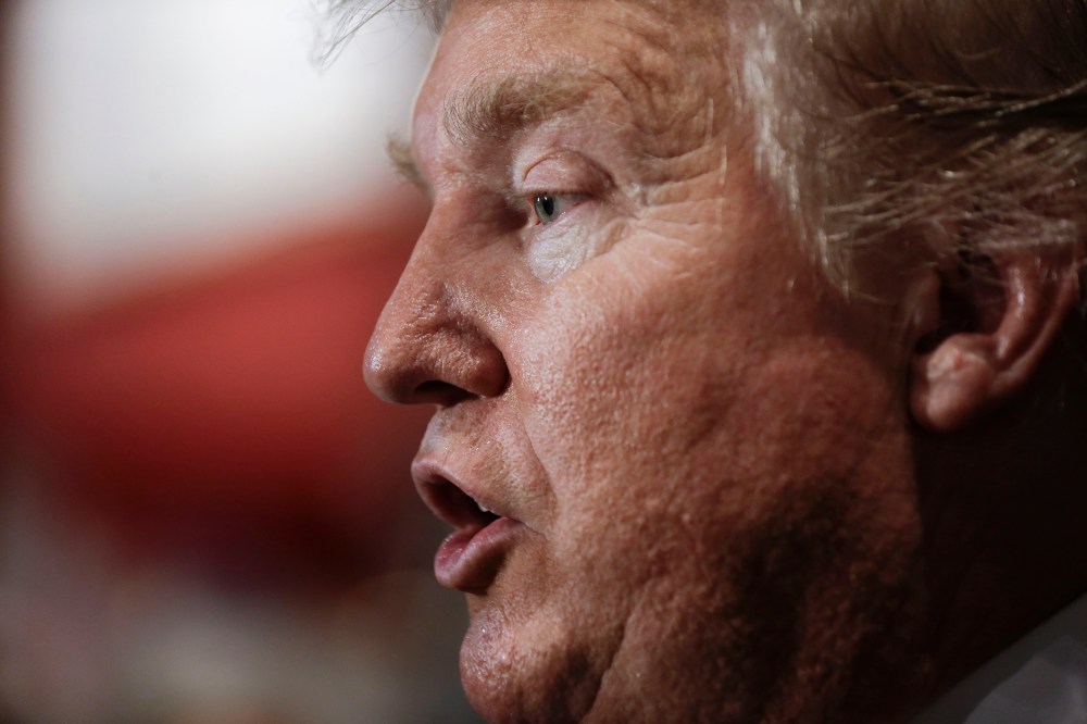 Republican presidential candidate Donald Trump answers questions with reporters after speaking at the National Federation of Republican Assemblies on Aug. 29, 2015, in Nashville, Tenn. (Photo by Mark Humphrey/AP)