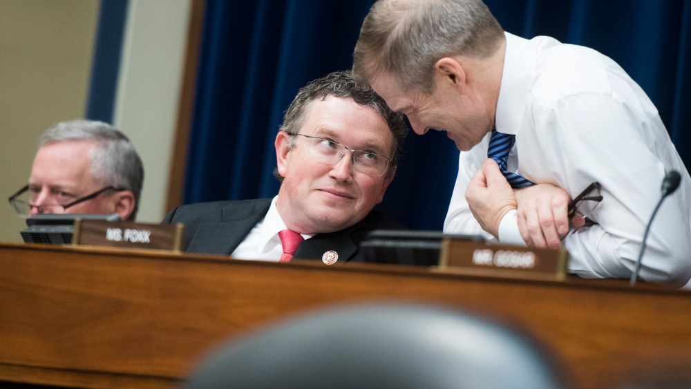 Reps. Thomas Massie, R-Ky., center, Jim Jordan, R-Ohio, right, are seen during a House Oversight and Reform Committee hearing on Tuesday, April 9, 2019.