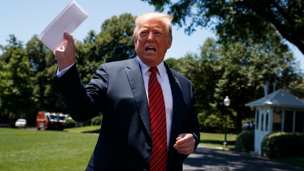 President Donald Trump speaks to reporters before departing for a trip to Iowa, on the South Lawn of White House, Tuesday, June 11, 2019, in Washington.