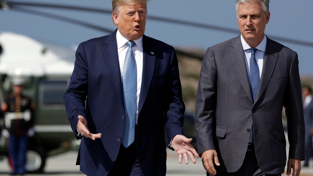 President Donald Trump and Robert O'Brien, just named as the new national security adviser, walk to speak to the media at Los Angeles International Airport, Wednesday, Sept. 18, 2019, in Los Angeles.