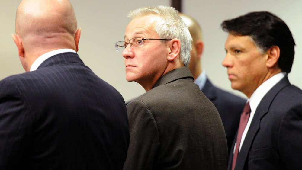 In this Thursday, April 19, 2012, file photo, Oscar Ray Bolin Jr. watches as jurors walk into the courtroom in Tampa, Fla. (Photo by Chris Urso/The Tampa Tribune/AP)