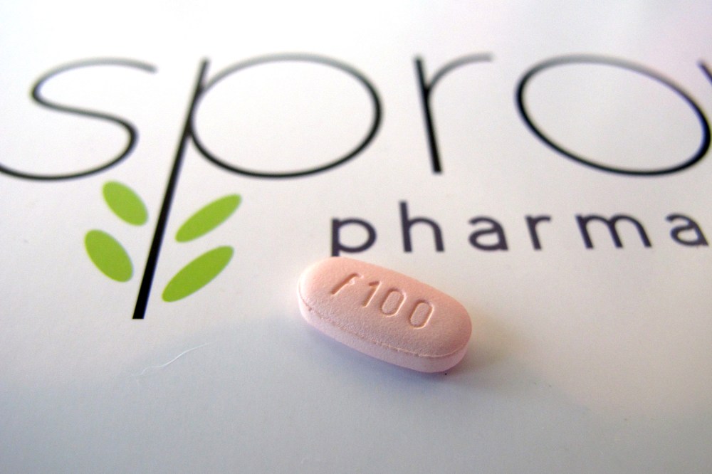 In this June 22, 2015, photo, a tablet of flibanserin sits on a brochure for Sprout Pharmaceuticals in the company's Raleigh, N.C., headquarters. (Photo by Allen G. Breed/AP)