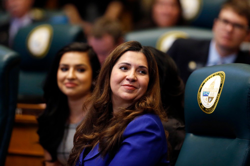 Colorado Democratic State Representative Crisanta Duran sits at her desk on the opening day of the 2016 Colorado Legislature, at the Capitol, in Denver, Jan. 13, 2016. (Photo by Brennan Linsley/AP)