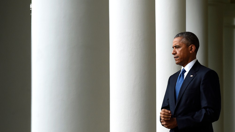 President Barack Obama walks to the Rose Garden of the White House in Washington, D.C., June 26, 2015. (Photo by Susan Walsh/AP)