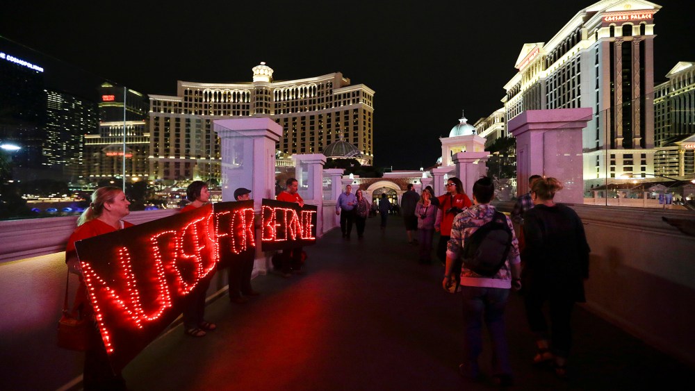 Members of the National Nurses United union hold LED signs to show their support for Democratic presidential candidate Sen. Bernie Sanders, I-Vt., Feb. 17, 2016, in Las Vegas. (Photo by Jae C. Hong/AP)