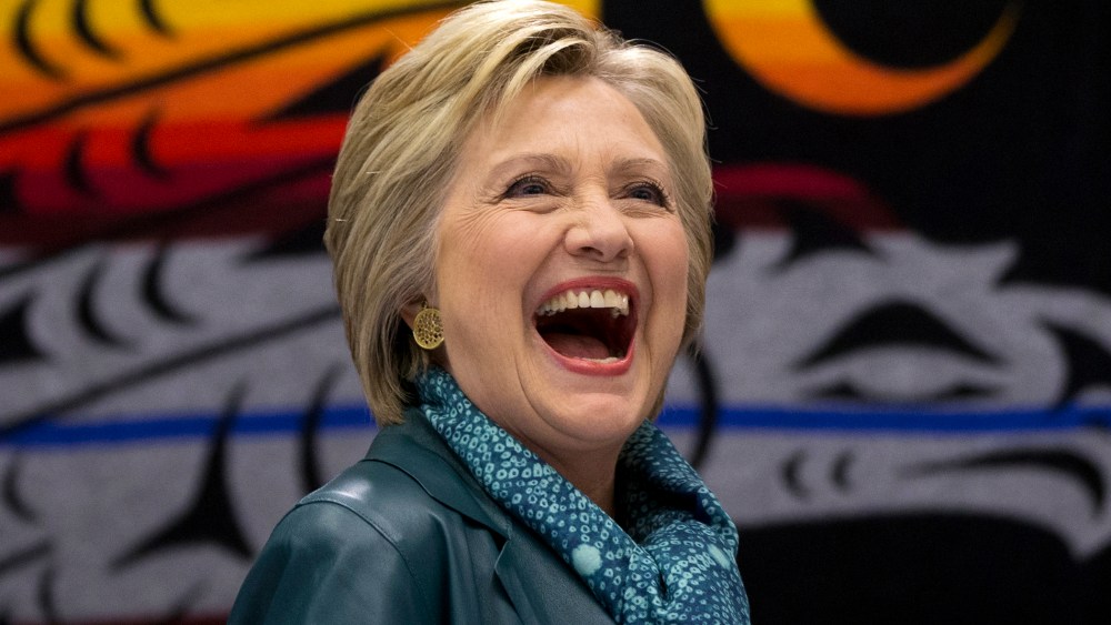 Democratic presidential candidate Hillary Clinton laughs as she participates in a roundtable with Washington Tribal Leaders at Chief Leschi School in Puyallup, Wash., March 22, 2016. (Photo by Carolyn Kaster/AP)