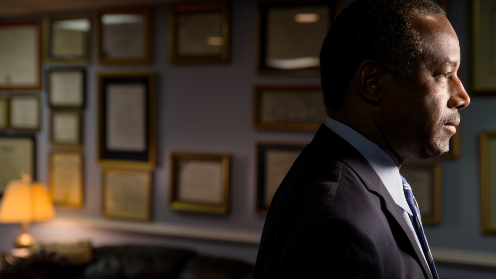 Republican presidential candidate Dr. Ben Carson awaits an interview in his home in Upperco, Md., Dec. 23, 2015. (Photo by Andrew Harnik/AP)