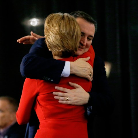 Republican presidential candidate Sen. Ted Cruz, back, R-Texas, hugs Carly Fiorina before speaking during a rally, April 20, 2016, at the Antique Automobile Club of America Museum in Hershey, Pa. (Photo by Julio Cortez/AP)