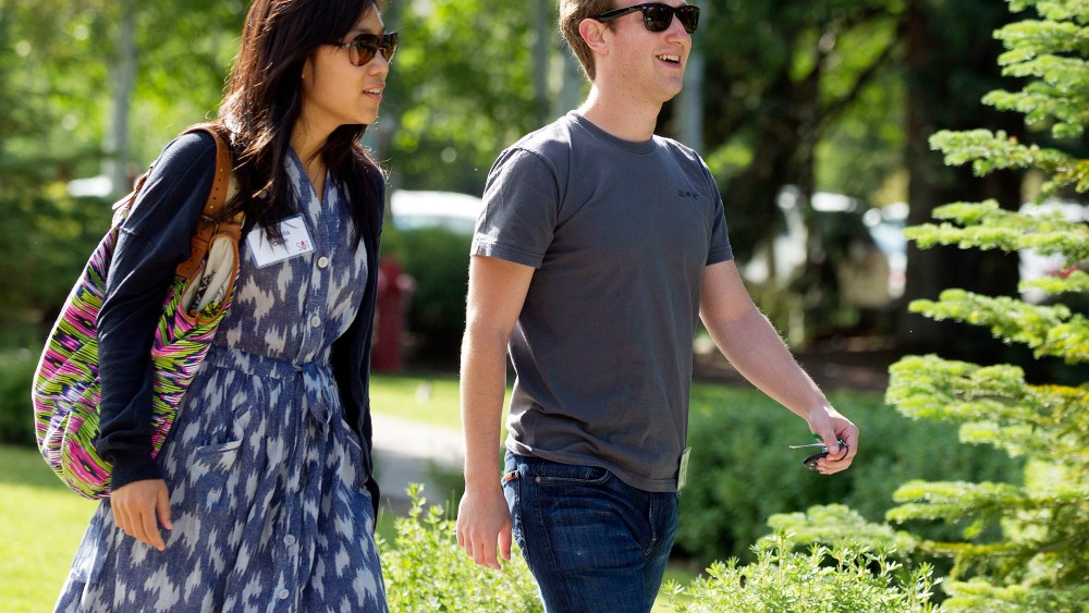 Mark Zuckerberg and wife Priscilla Chan (Photo by Julie Jacobson/AP).